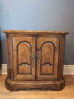 Front view of oak cabinet side table