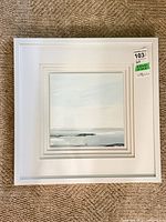 Front view of square framed abstract seascape art