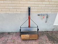 Full view of roller showing drum, frame, hitch post