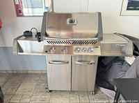 Front view of stainless Napoleon Prestige 500RB grill