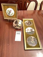 Full lot showing framed plates, loose plate and stand