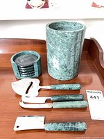 Overall lot showing wine cooler, coaster set and four cheese knives