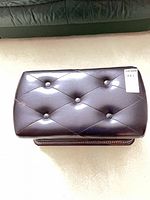 Top view showing diamond-tufted leather lid