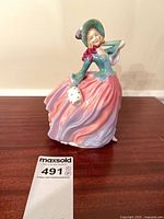 Front view of Royal Doulton Autumn Breezes figurine