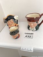 All three Royal Doulton character jugs grouped