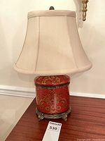 Full view of table lamp with shade and base