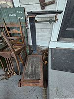Full view of Fairbanks platform scale beside porch