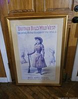 Full view of framed print leaning against door