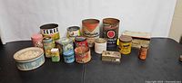 Full lot frontal view showing all tins