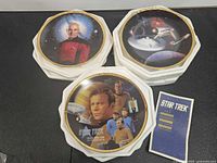 Three Star Trek collector plates with insert card