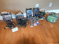 Full lot showing all boxed lights, loose strings, bulb packs and hooks