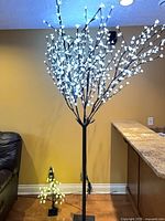 Tall LED blossom floor lamp lit
