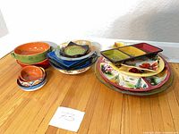 All 16 ceramic pieces grouped on floor