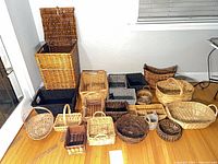 Wide shot of entire group of baskets laid out on floor