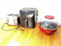 Front view of all three appliances side by side on floor