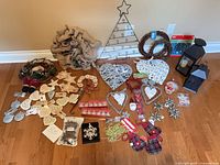 Full grouping of all Christmas décor items on floor