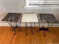 Front view of all three marble top side tables