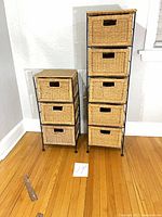 Front view of both storage towers showing full height and basket count