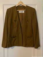 Full view of blazer on hanger