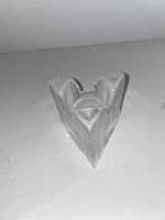 front view showing ribbed glass texture and triangular form