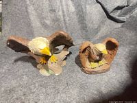 Front view of both eagle figurines