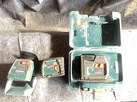 Overview of three Bosch laser units and hard case