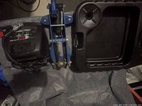 Overview of battery charger, blue jack, oil drain pan