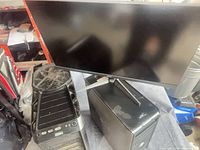 Acer monitor atop Dell and Antec towers