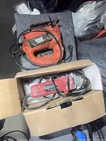 Black & Decker jig saw and Skil grinder in box