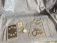 Overview of all items laid out on grey felt background