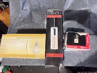 Three boxed pendant lights: Westwood Collections, Omega Essence, Emerson