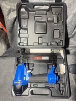 Mastercraft brad nailer seated in molded carrying case