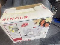 Front of Singer Prelude 8280 retail box