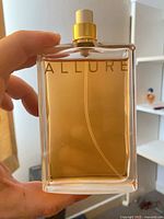 Front view of Allure bottle with cap