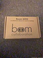 Sealed box top showing Boom Mini branding