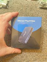 Front of sealed Ottocast Play2Video adapter box