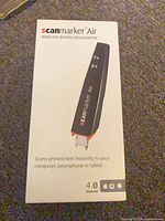 Retail box front showing Scanmarker Air branding and feature text