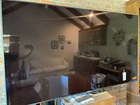 Front view of Sony 75-inch TV on stand