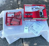 Boxed Nextec drill driver kit and 19-piece bit kit