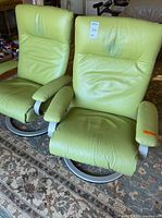 Front view of both light green Lafer Kiri recliners
