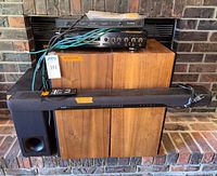 Front view of entire lot: soundbar, subwoofer, ADS speakers, ProTec receiver, Yamaha KP-300 processor