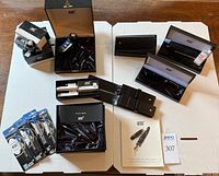 Overview of pens, ink, refills, accessory boxes and packaging