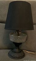 Full view of converted oil lamp with black shade