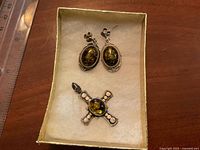 Pendant and earrings in display box