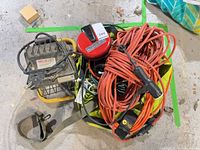 Top view showing work light, red cord reel, multiple coiled cords