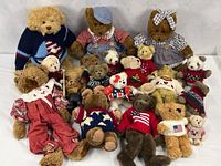 Group shot of entire plush bear and moose collection