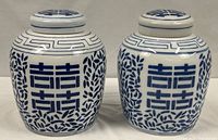 Front view showing both matching ginger jars with lids
