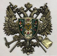 Full view of brass double-headed eagle plaque