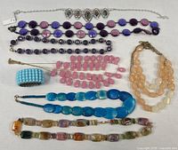 Group shot of all nine jewelry pieces laid out