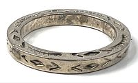 Side view of sterling silver band showing geometric pattern